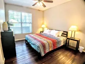Furnished living room with sofa and TV